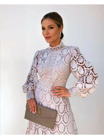 Amélie French lace dress in apricot, showcasing intricate lace details and a stylish, elegant dress design.