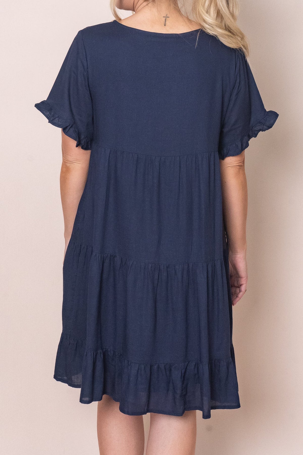 Tiered knee-length dress with a round neckline