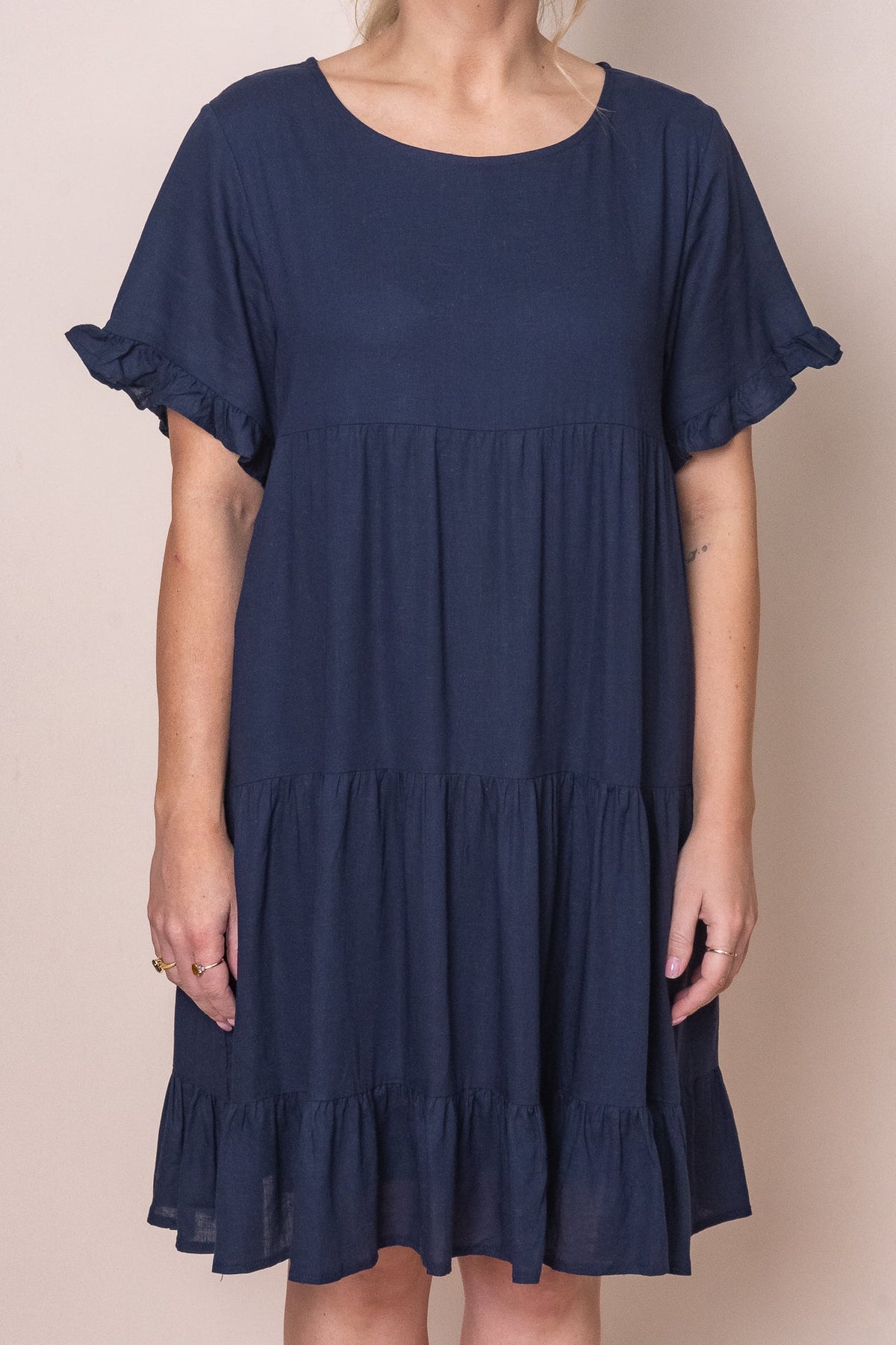 Tiered knee-length dress with a round neckline