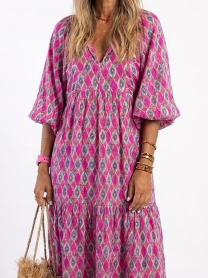 Tiered midi dress with a V-neckline