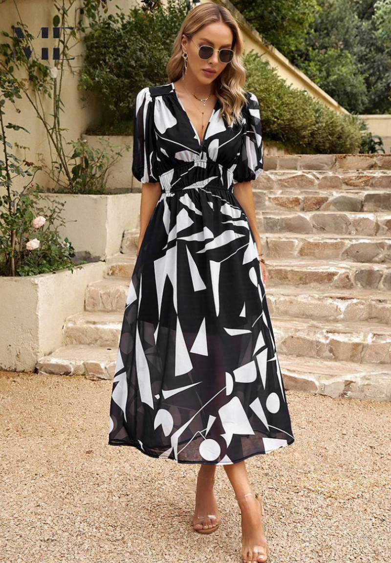 Black-and-white geometric-print V-neck midi dress, front view